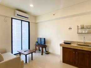 Cozy Living and Modern Look 2BR at Meikarta Apartment By Travelio